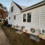 Two heat pump units inspected during an end-of-summer AC tune-up in Sarnia, Ontario